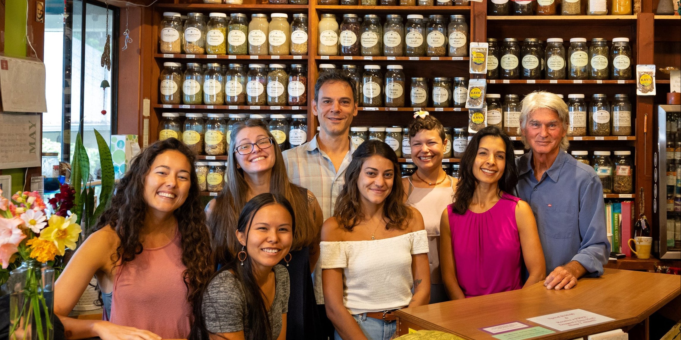 the dragons den staff behind the counter at the store